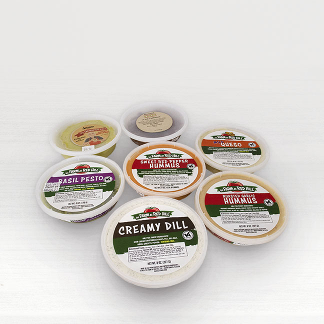 A collection of dips and spreads offered by Seasonal Roots